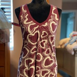 ROXY sleeveless burgundy short with cream colored heart/swirl designs.  Size S.